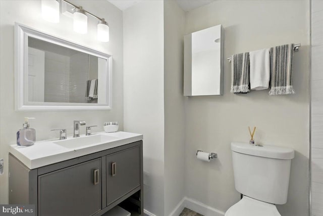 9701 Fields Rd Unit 2301, Gaithersburg, MD 20878 - bathroom with toilet, vanity, and baseboards
