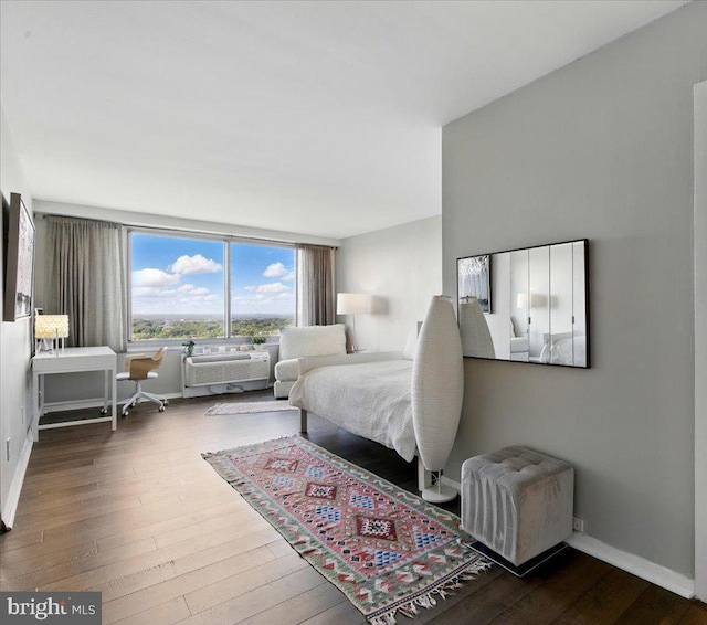 9701 Fields Rd Unit 2301, Gaithersburg, MD 20878 - bedroom with hardwood / wood-style flooring and baseboards