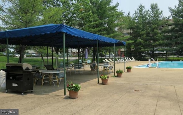 9701 Fields Rd Unit 2301, Gaithersburg, MD 20878 - view of home's community featuring a swimming pool, a gazebo, a patio, and fence