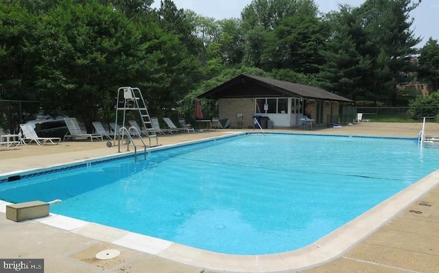 9701 Fields Rd Unit 2301, Gaithersburg, MD 20878 - community pool featuring fence and a patio