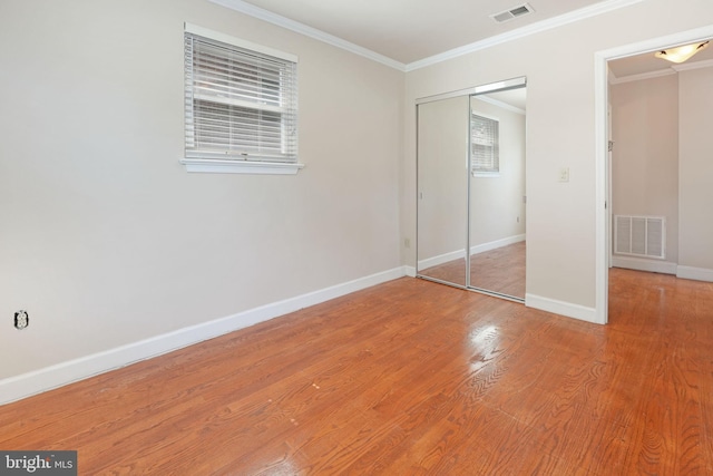 2629 Colston Dr, Chevy Chase, MD 20815 - unfurnished bedroom with baseboards, visible vents, ornamental molding, and a closet