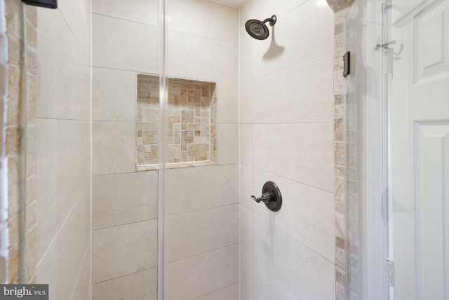 bathroom featuring a stall shower