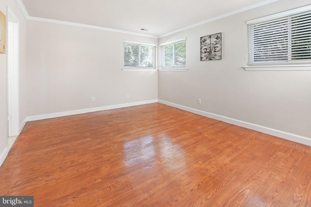 2629 Colston Dr, Chevy Chase, MD 20815 - spare room featuring baseboards, ornamental molding, and wood finished floors