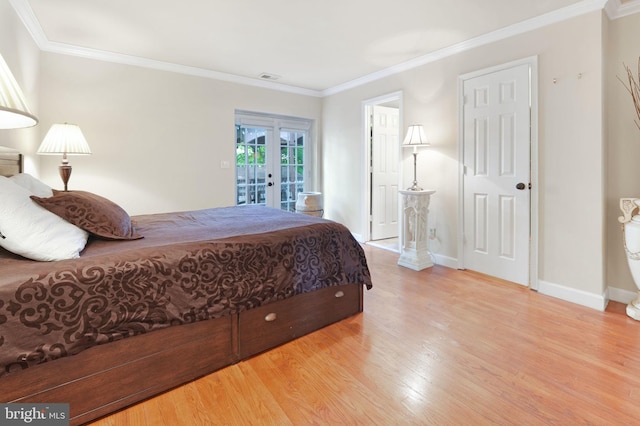 bedroom featuring ornamental molding, wood finished floors, access to exterior, baseboards, and french doors
