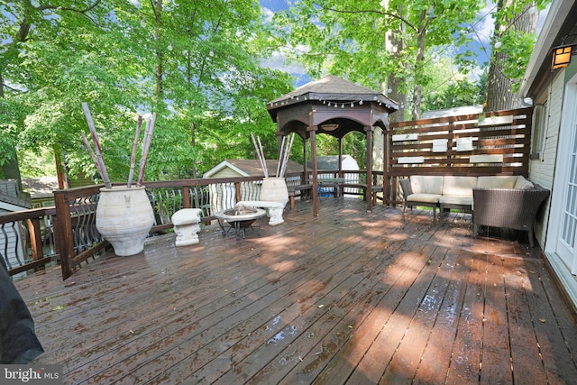 wooden terrace with a gazebo