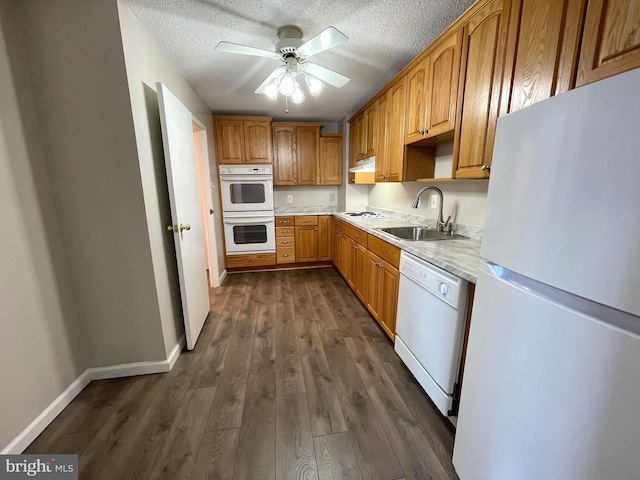 200 N Pickett St Unit 1412, Alexandria, VA 22304 - kitchen with a sink, a textured ceiling, white appliances, and light countertops