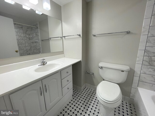 200 N Pickett St Unit 1412, Alexandria, VA 22304 - bathroom featuring a shower, baseboards, a bathing tub, vanity, and toilet