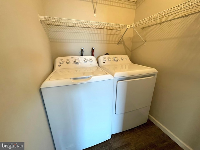 200 N Pickett St Unit 1412, Alexandria, VA 22304 - laundry room featuring baseboards, laundry area, independent washer and dryer, and dark wood-type flooring