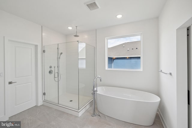 full bathroom with visible vents, marble finish floor, recessed lighting, a soaking tub, and a stall shower