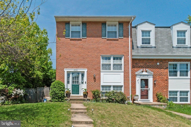 multi unit property featuring brick siding