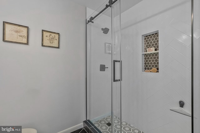 full bath with a shower stall and toilet
