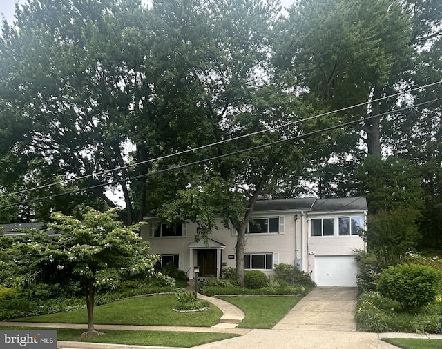 6225 Cheryl Dr, Falls Church, VA 22044 - view of front of house featuring an attached garage, driveway, and a front yard