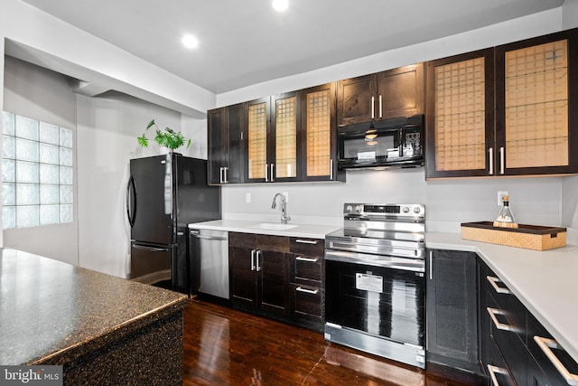 3700 13th St NW, Washington, DC 20010 - kitchen featuring black appliances, dark wood-style floors, and recessed lighting