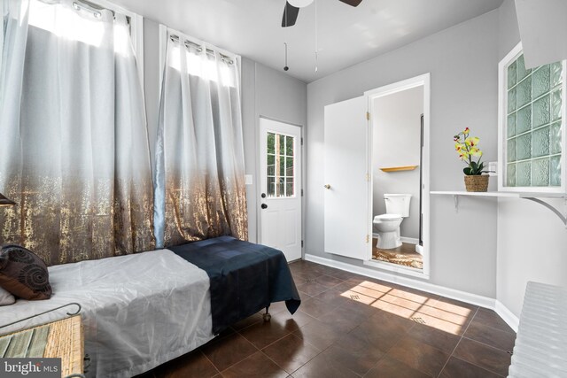 3700 13th St NW, Washington, DC 20010 - bedroom with tile patterned floors, ensuite bathroom, and a ceiling fan