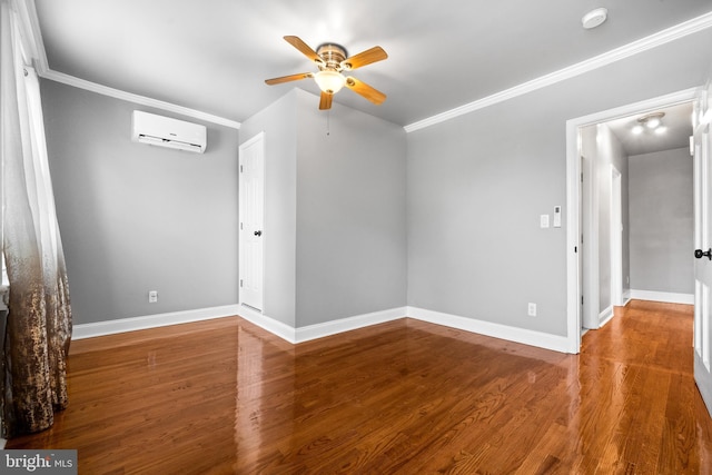 3700 13th St NW, Washington, DC 20010 - empty room with a wall unit AC, ceiling fan, a smoke detector, crown molding, and wood finished floors