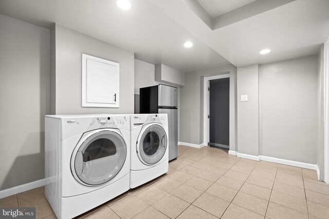 3700 13th St NW, Washington, DC 20010 - laundry area featuring independent washer and dryer, recessed lighting, and light tile patterned floors