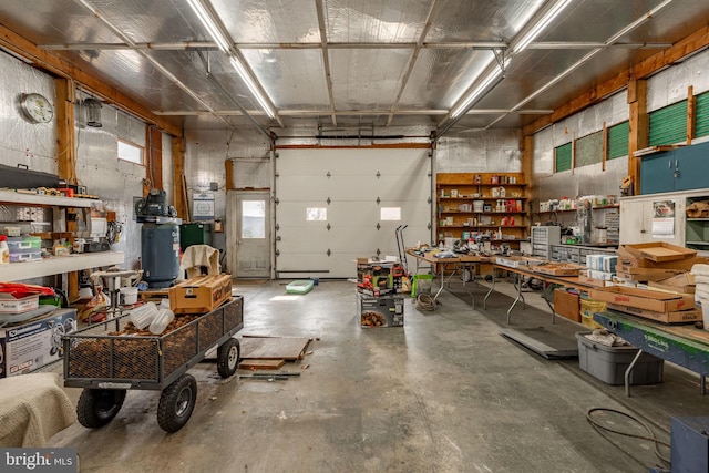 garage with a workshop area