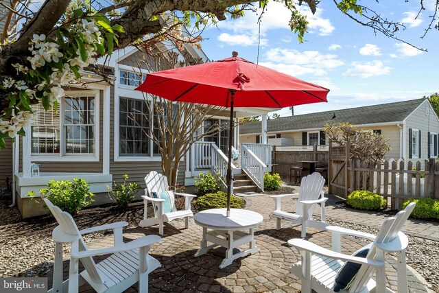 view of patio with fence