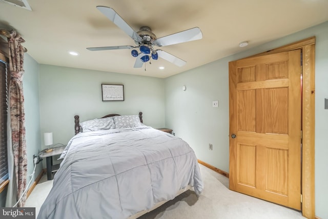 bedroom featuring recessed lighting, baseboards, visible vents, and light carpet