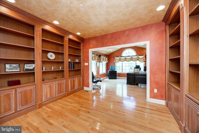 unfurnished office with baseboards, light wood finished floors, and recessed lighting