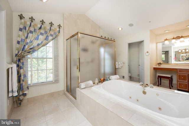 full bathroom with toilet, tile patterned floors, vaulted ceiling, a shower stall, and a whirlpool tub