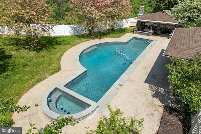 view of pool featuring outdoor lounge area, a gazebo, a lawn, and a fenced backyard