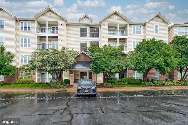 1530 Spring Gate Dr Unit 9208, Mclean, VA 22102 - view of property with uncovered parking