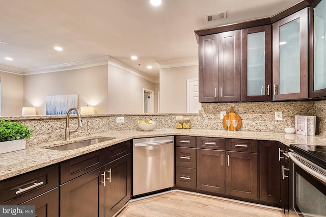 1530 Spring Gate Dr Unit 9208, Mclean, VA 22102 - kitchen featuring appliances with stainless steel finishes, a sink, dark brown cabinets, crown molding, and light stone countertops