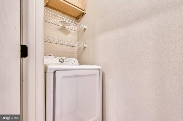 1530 Spring Gate Dr Unit 9208, Mclean, VA 22102 - washroom with washer / dryer and cabinet space