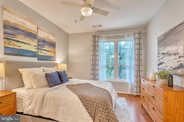 1530 Spring Gate Dr Unit 9208, Mclean, VA 22102 - bedroom featuring wood finished floors and a ceiling fan