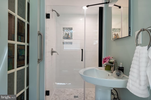 full bathroom with a shower stall
