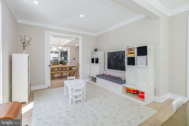 5116 Lawton Dr, Bethesda, MD 20816 - living room with ornamental molding, a chandelier, baseboards, light wood finished floors, and recessed lighting
