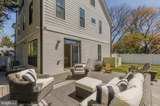 5116 Lawton Dr, Bethesda, MD 20816 - view of patio featuring an outdoor hangout area, a wooden deck, and fence