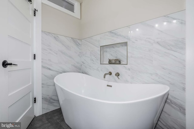5116 Lawton Dr, Bethesda, MD 20816 - full bathroom with tile walls and a soaking tub