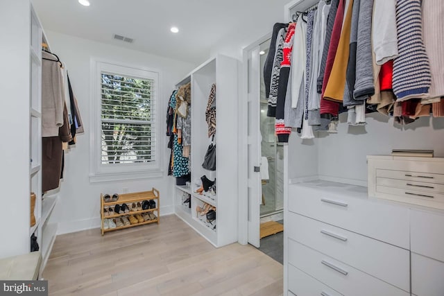 5116 Lawton Dr, Bethesda, MD 20816 - walk in closet featuring light wood-style flooring
