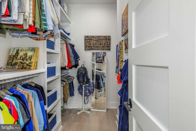 5116 Lawton Dr, Bethesda, MD 20816 - walk in closet featuring wood finished floors