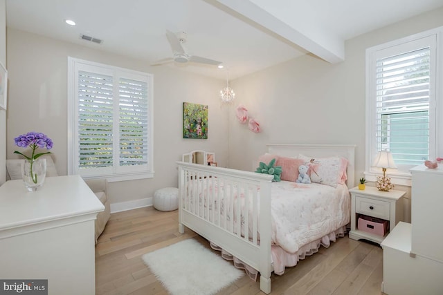 5116 Lawton Dr, Bethesda, MD 20816 - bedroom with multiple windows, light wood-style flooring, beamed ceiling, recessed lighting, and baseboards