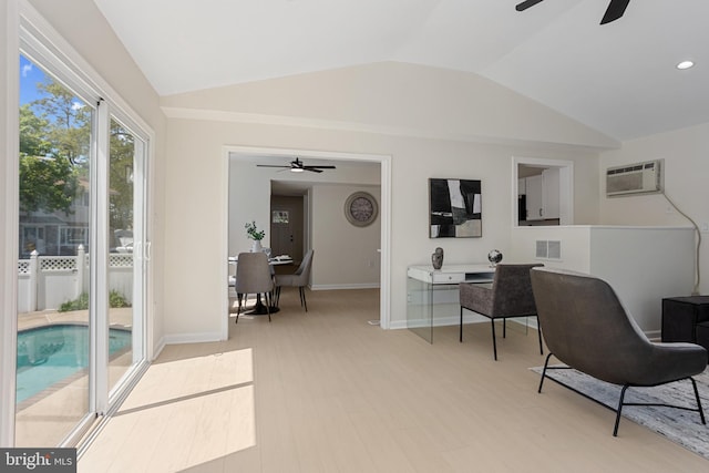 office with a ceiling fan, baseboards, visible vents, and lofted ceiling