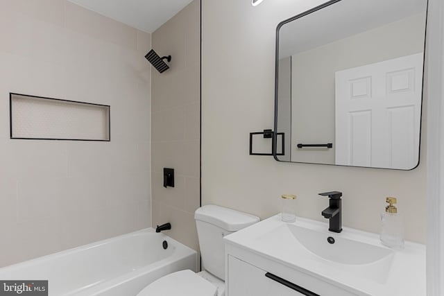 full bath featuring shower / bath combination, vanity, and toilet