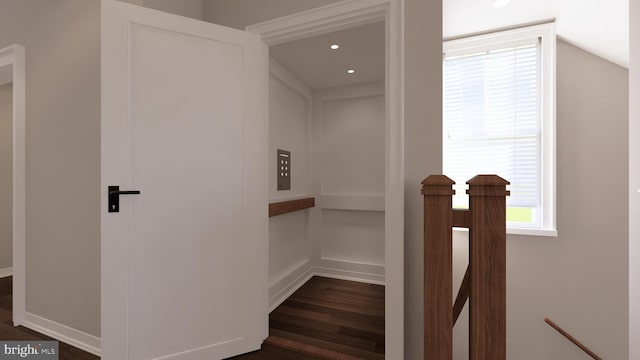 2555 Riva Rd, Annapolis, MD 21401 - hall with dark wood-type flooring and elevator