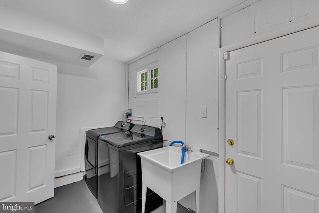7509 Glade Dr, Fort Washington, MD 20744 - washroom featuring separate washer and dryer