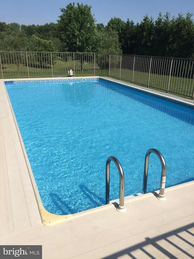 402 Waltham Dr, Middletown, DE 19709 - view of pool with a fenced in pool and fence