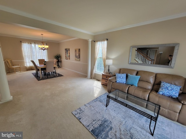 402 Waltham Dr, Middletown, DE 19709 - living area with carpet floors, baseboards, a chandelier, ornamental molding, and ornate columns
