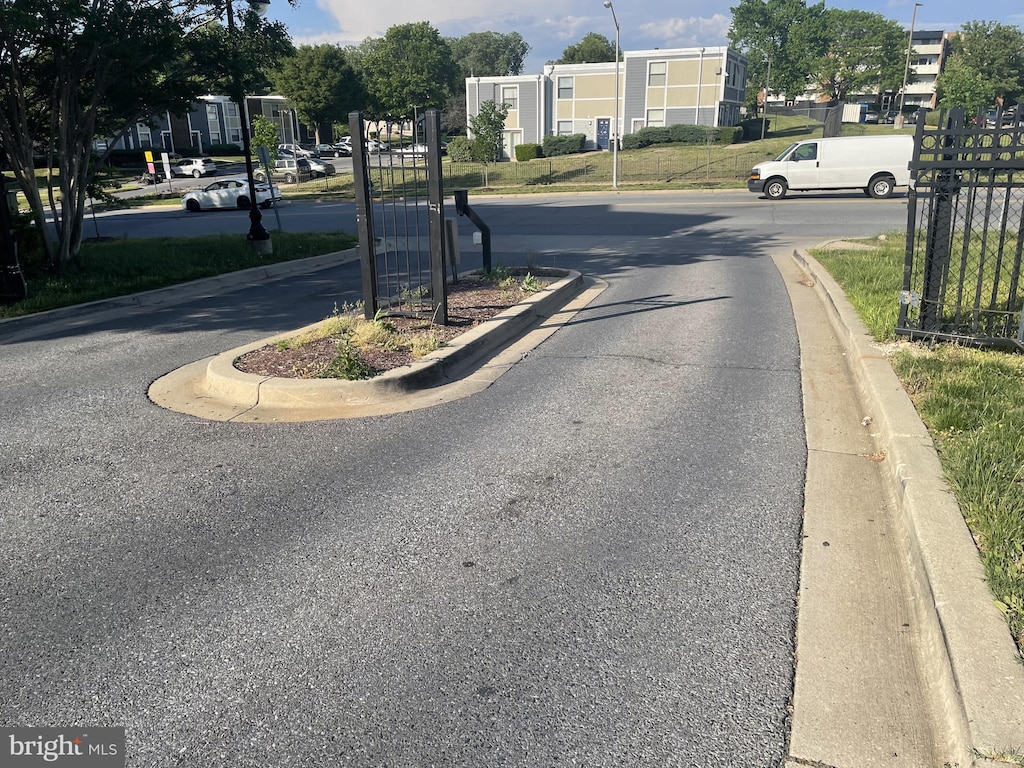 1321 Karen Blvd Unit 306, Capitol Heights, MD 20743 - view of asphalt street featuring curbs and a residential view