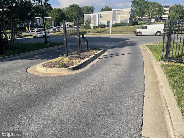 1321 Karen Blvd Unit 306, Capitol Heights, MD 20743 - view of asphalt street featuring curbs and a residential view