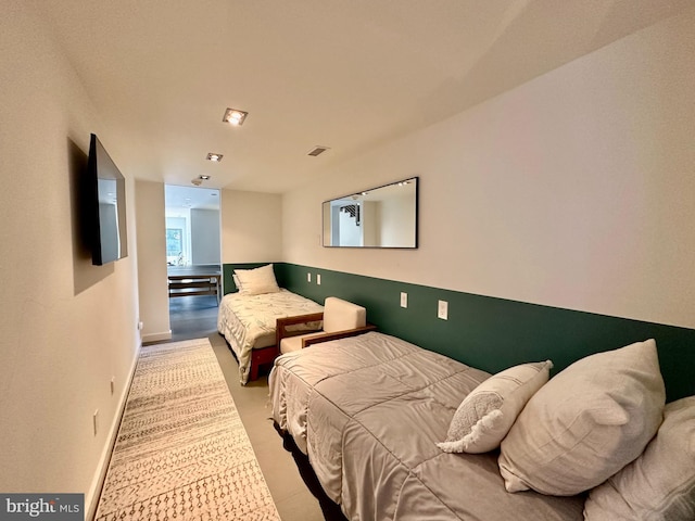 bedroom featuring baseboards