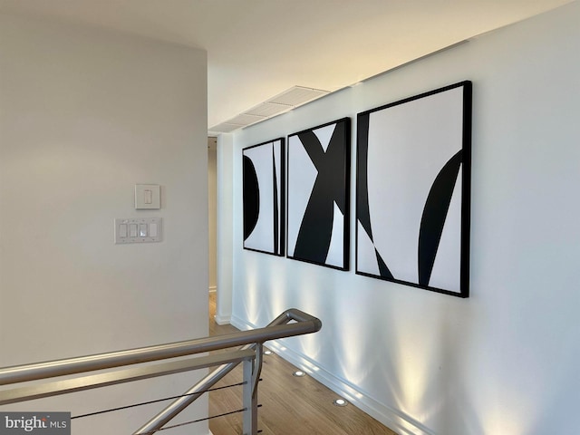 interior details featuring baseboards and wood finished floors