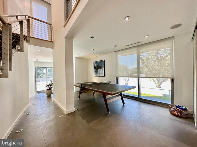 2 Ocean Dr W, Brigantine, NJ 08203 - playroom with baseboards, concrete floors, recessed lighting, and visible vents