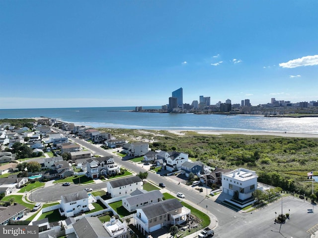 bird's eye view with a water view and a view of city