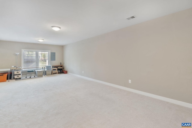 interior space with baseboards, visible vents, and carpet